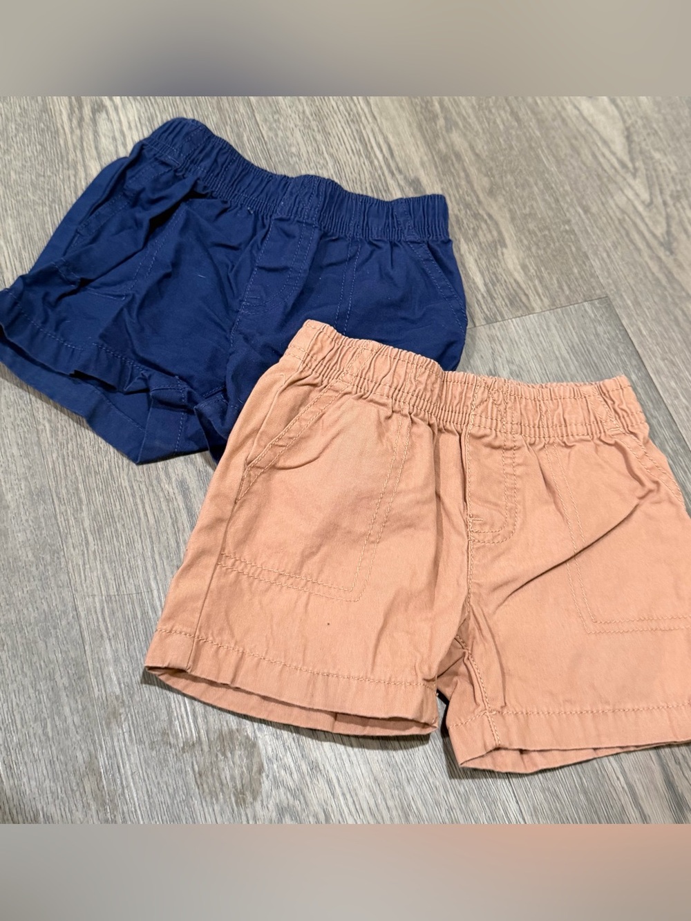 2 Pairs Of Carter’s Baby Boy’s Blue & Peach Pull On Shorts  Size 12 Months